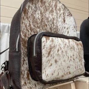 Handmade cow-hide leather backpack with front pocket